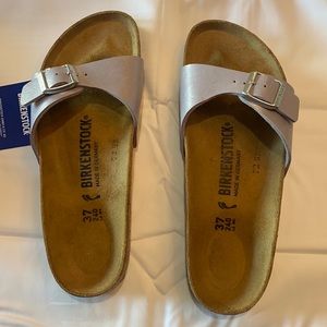 Brand new Birkenstock Lilac sandals. No box. Size 37 which converts to 6-6.5.